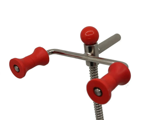 Close-up of 15 Inch Steering Wheel Holder Alignment Tool With Adjustable Height And Locking Switch showing red grips and metal rod