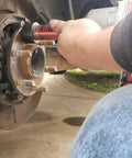 Wheel Stud Installer Tool Replacement 22800 For Most Light-Duty Trucks And Cars in use on vehicle hub