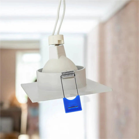 Lawsen Spring Clips Recessed Lighting 100 Pcs Spring Snap Downlight Clips attached to a ceiling mounted LED lamp holder.