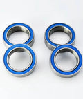 Steel Sealed Bearing 6700 2RS 10x15x4mm For 1/10 RC Cars Upgrade Part High Precision Metal Bearing Improves Transmission Efficiency And Power Transfer Durable Replacement Accessory For RC Car Enthusiasts. Four blue sealed bearings on white background