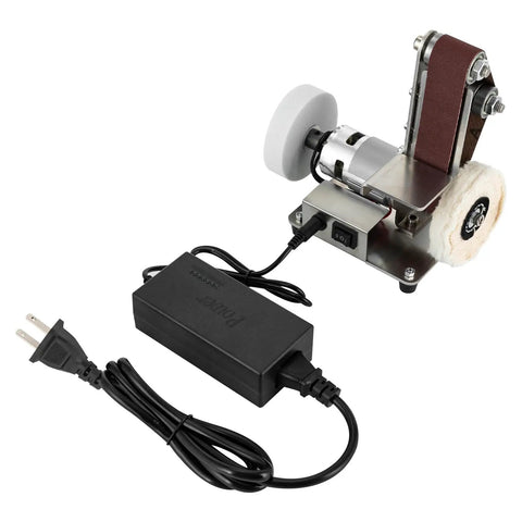 Smooth Operator Mini Belt Sander And Bench Grinder With Variable Speed Dial Forward Reverse Switch And Angled Table For No Sweat Woodworking And Fast Metal Buffing On Any Bench, compact design with power adapter.