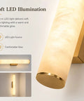 Soft LED illumination of JCQASRT 19.69 in Modern Wall Sconce, resin shade and brass gold base in a warm glow.