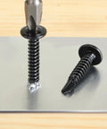 Black Self Tapping Screws Assortment Kit 190 Pieces Stainless Steel 410 Self Drilling Screws For Metal Wood Plastic With Truss Head Eight By One Half Inch Eight By Three Quarters Inch Eight By One Inch, shown drilled into metal surface with truss head visible.