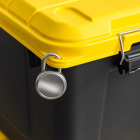 Top Shelf 21 Gallon Storage Totes 4 Pack Heavy Duty Lockable Bins With Airtight Weatherproof Gasket Seal Keeps Your Loot Safe And Sound Black Yellow Made In Usa close-up of yellow lid and metal lock