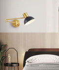 Badass Industrial Metal Swing Arm Wall Sconce With Rock Solid Adjustable Dome Shade And E27 Socket Hella Sturdy For Bedroom Reading Vibes And Slick Black Brass Finish Modern Wall Lamp, mounted next to a bed.