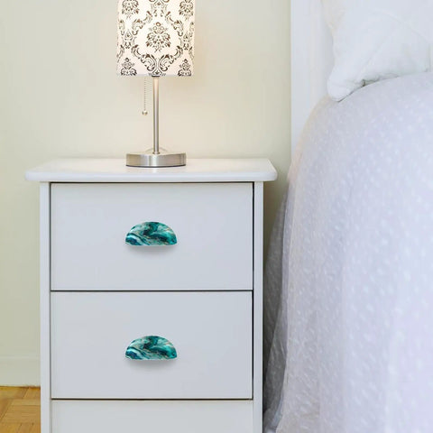 Premium Teal Marble Cabinet Cup Pulls Boasting A Killer Stone Finish and Super Slick Texture on white nightstand.