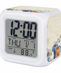 Chic Blue Pumpkin Digital Alarm Clock With Fall Leaf Texture Silent Snooze Button Warm Nightlight Retro Dial Display showing time and temperature.