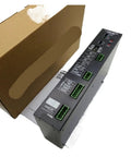 Industrial Motion Controller And Motor Driver For Automation Gear next to cardboard box