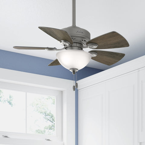 Matte silver 34 inch indoor ceiling fan with LED light, 5 blades, and pull chain in modern home office setting