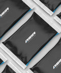 Black and white packaging for ASIR products with blue accents, arranged in a pattern.