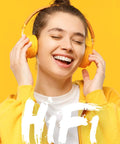 Person wearing yellow headphones enjoying music, representing 64GB Bluetooth MP3 Player With A19 2.4 Inch Curved Screen experience