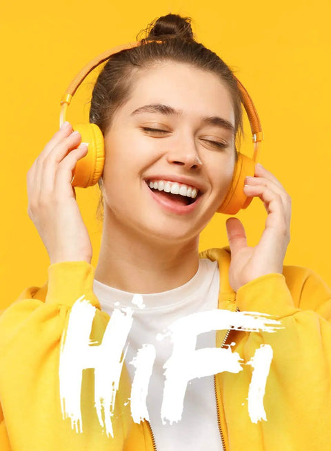 Person wearing yellow headphones enjoying music, representing 64GB Bluetooth MP3 Player With A19 2.4 Inch Curved Screen experience