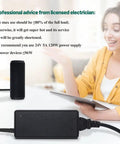Woman sitting at desk reviewing specifications for Beefy 24V DC Power Adapter 5A Switching Power Supply, device on desk.