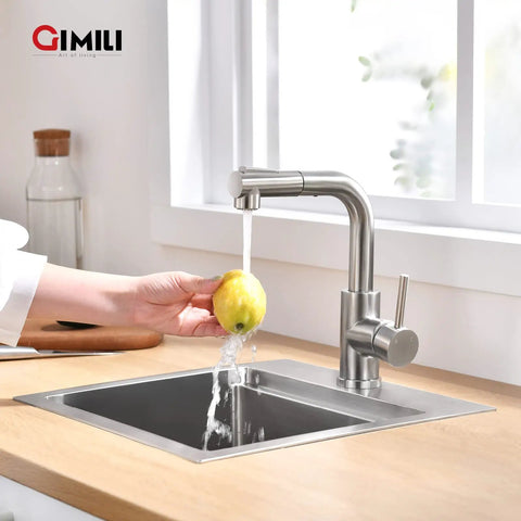 Pull Out Sprayer Bar Sink Faucet With Single Handle For Kitchen, Brushed Nickel Finish, water flowing over lemon