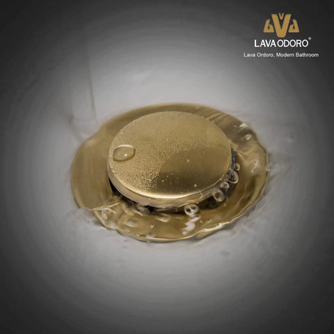 Close-up of brushed gold pop-up drain for Brushed Gold Single Hole Bathroom Faucet With Pop Up Drain, Modern One Handle Vanity Sink Tap