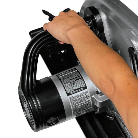 Beefy 15 Amp Electric Circular Saw With 2300 Rpm Motor and Quick Electric Brake operated by hand, showcasing the motor and grip.