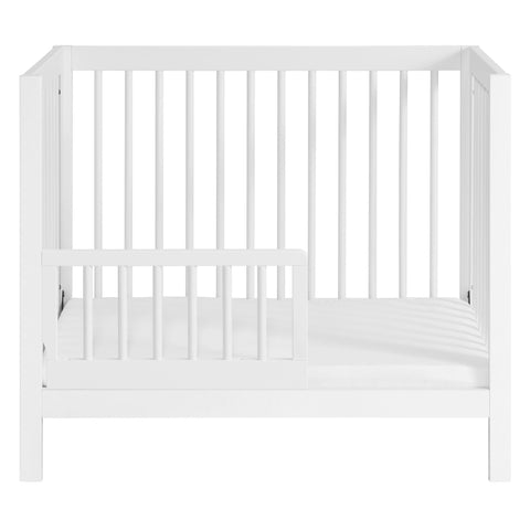 Mini Crib To Toddler Bed Guard Rail Conversion Kit In White, No Fuss Install, fits standard mini cribs, visible side view
