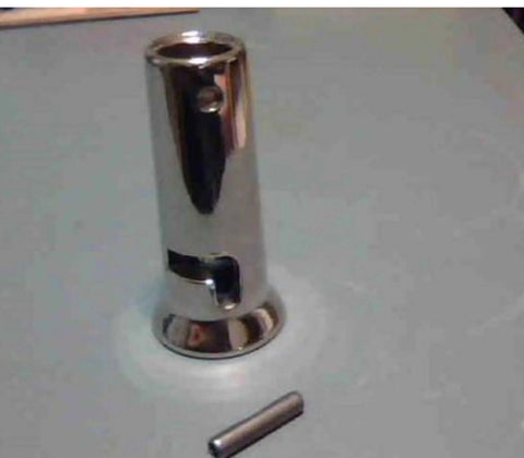 Close-up of nickel plated roll shutter crank handle bell replacement kit with spring pin for half inch diameter pole repair.