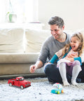 Father and daughter playing with 4.72 Inch Miniature Pickup Truck Model Alloy Metal Figurine For Collectors Who Dig in living room