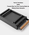 Heavy Duty Stainless Steel Espresso Knock Box With Shock Absorbing Removable Knock Bar And Spill Resistant Grounds Waste Dispenser top view with wooden handle