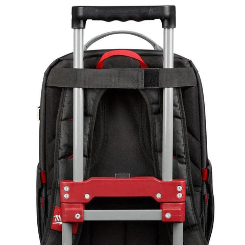 Badass Low Profile Backpack With Twenty Two Pockets And Heavy Load Bearing Harness For Tradesmen Ballistic Canvas Build showing the padded back and trolley handle.
