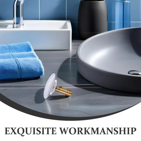 Copper Pop up Bathtub Plug with Bounce Design for Drain Hole placed near a modern sink with blue towels.