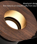Close-up of Top Tier Wood Grain Recessed Downlights Led Ceiling Potlights with golden inner trim.