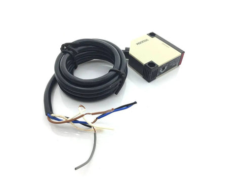 Retroreflective Photoelectric Beam Sensor Switch 12-24V DC, 4m Detection Range, wall mounted with reflector panel, shown with cables.