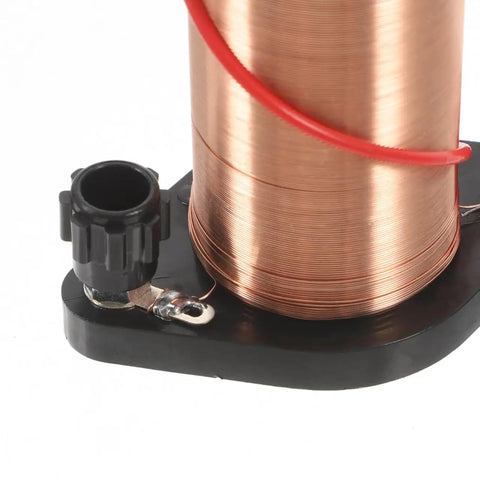 Close-up of copper coil from Hands On Electromagnetic Induction Solenoid Kit For High School Physics With Primary And Secondary Coils.