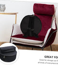 Tour Ready Waterproof Drum Backpack And Oxford Cloth Gig Bag With Padded Adjustable Straps on chair, round shape for instrument storage.