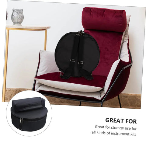Tour Ready Waterproof Drum Backpack And Oxford Cloth Gig Bag With Padded Adjustable Straps on chair, round shape for instrument storage.