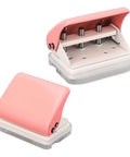 Front and side view of pink three hole punch handheld paper puncher with five sheet capacity and alignment posts for B5 A5 A4 A6 A7 sized papers.