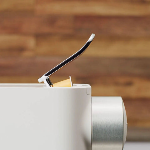 One Touch Automatic Milk Coffee Brewer With Integrated Frother For Barista Level Espresso detailed view of the capsule holder.