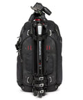 Black Pro Photo Backpack For Camera Gear Loadout With Four Access Points, tripod attached on front, front view.
