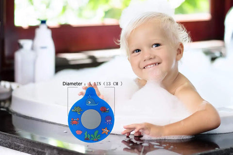 Child playing in bubbles holding a blue Slick Silicone Bathtub Drain Stopper, Hella Leak Proof Tub Cover, 5.1 inches.
