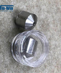 Front view of two-piece Allfi waterjet valve seat: metal conical poppet seat and clear cap.