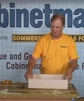 Top Shelf Dovetail Jig Kit For Woodworking Pros Featuring Preassembled Plates Router Bits And Locking Clamps Hella Tough Construction Dead On Alignment For Fast Cabinet Projects in use with wood.