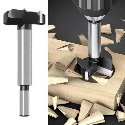 Hole saw cutter drill bit, 18mm, steel, installed in drill for wood boring