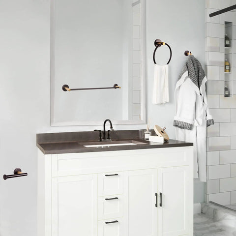 Kelton 4 Piece Matte Black And Satin Gold Bath Accessory Set installed in modern white bathroom, featuring towel bar and ring.