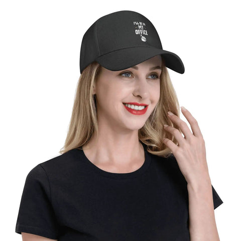 Woman wearing Adjustable Washed Baseball Cap Dad Hat For Adults, Plain Trucker Style For Office Or Kitchen, Cool Casual Vibe, Unisex Everyday Hat With Back Strap, For Work And Play, smiling and touching her hair
