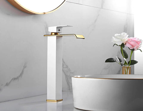 White Gold Waterfall Vessel Sink Faucet With Tall Deck Mount And One Hole Single Handle Vanity Lavatory Tap For Modern Baths Dope Finish Sleek Commercial Style Includes Supply Lines in white and gold next to a round sink.