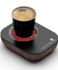 Keep Your Daily Joe Running Warm 240W Electric Coffee Mug Warmer With Seven Temp Settings Auto Shutoff Smart Desk Heater with coffee cup on it.