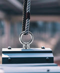 Beefy Heavy Duty Quarter Inch By Four Inch Eye Bolt Set In 304 Stainless Steel with nuts and washers installed on beam