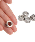 10 Pack Set Screw Shaft Collars 8mm Bore, 14mm OD, 7mm Width, Nickel Plated Carbon Steel displayed on a hand and table