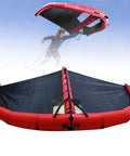 Inflatable Wing Surfing Kite for Kitesurfing and Wingsurfing, open window design in red and black, shown in water or snow use