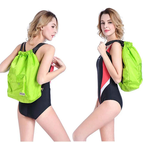 Model wearing green Dry Wet Separated Swim Bag With Drawstring Backpack, Waterproof Gym Pool Beach Gear Tote, 36x40cm, adjustable straps.
