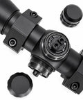 Close-up of Compact 4x32 Air Rifle Scope With Mil Dot Reticle For Crosman RepeatAir 1077, detailing adjustment knob and matte finish
