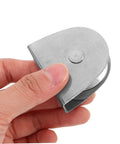 Badass 4 Piece Stainless Steel Flagpole Pulley Kit Featuring Smooth Bearing Wheels For Effortless Flag Raising Any Day And Built Tough Enough To Handle Rain Or Shine Because You Want Hardware That Lasts Long Without Rusting On Your Outdoor Pole. close-up of stainless steel pulley wheel in hand