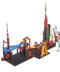 Crazy Reactions Building Kit 428 Components To Build Any Of Three Models, Hook It Up With Chain Reactions And Funny Machines, Expandable With Everyday Objects For Wild Creative Experiments. assembled chain-reaction model with ramps, towers, and bottle