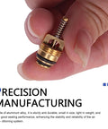 Close-up of hand holding brass valve from 17 Piece Car Air Conditioning Valve Core Kit With Caps And Service Valves For R12 R134A Systems
